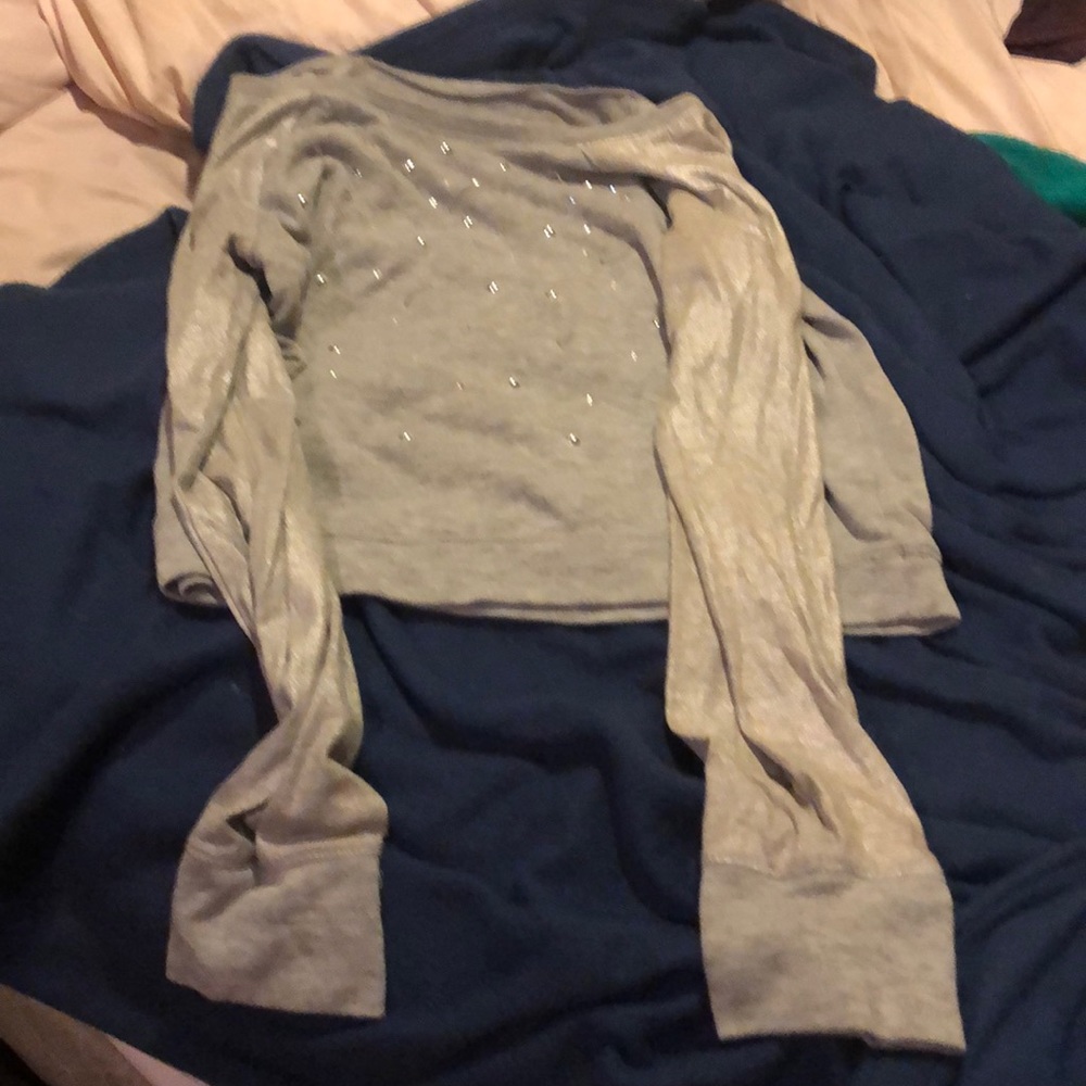 This shirt has a lot of sparkles